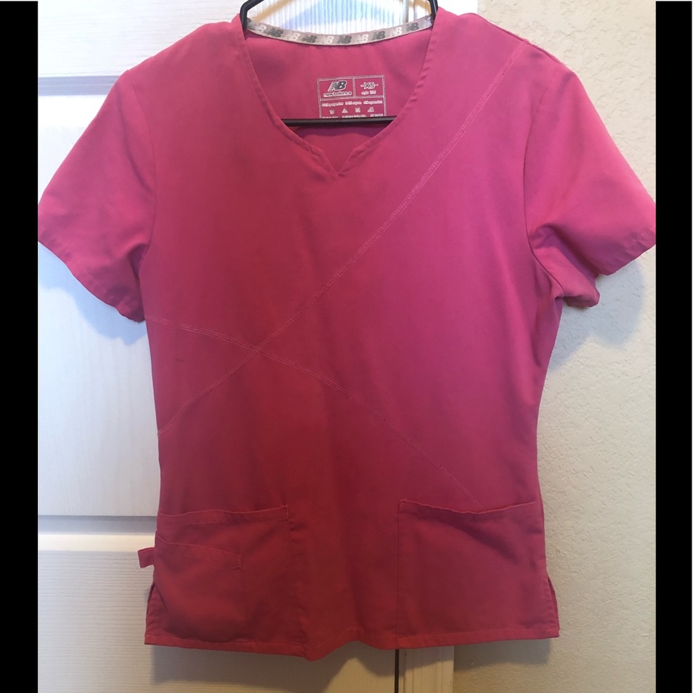 New balance scrub top
